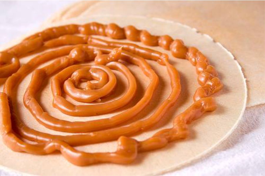 Descubre la deliciosa gastronomía de Medellín: desde la clásica arepa paisa hasta la icónica bandeja paisa 4 Obleas con arequipe
